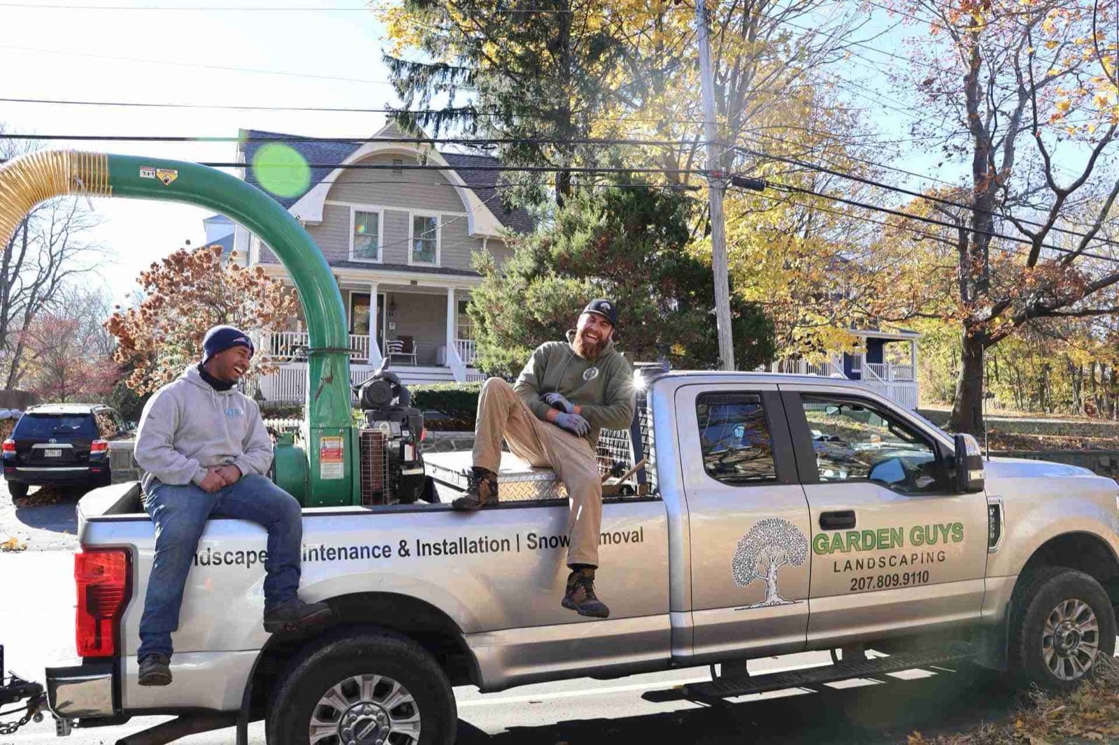 Garden Guys team on truck