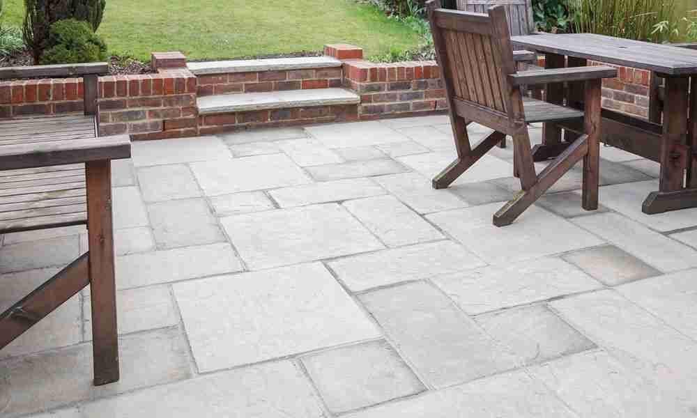 Stone patio hardscape installation in Portland, Maine
